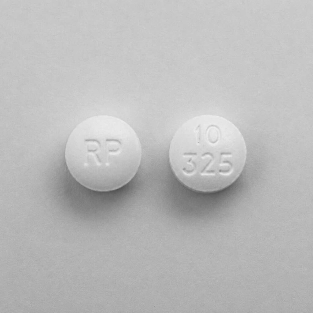 rp 10 325 white round pill